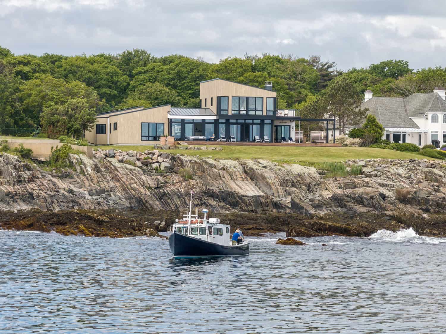 modern coastal home exterior with a water view