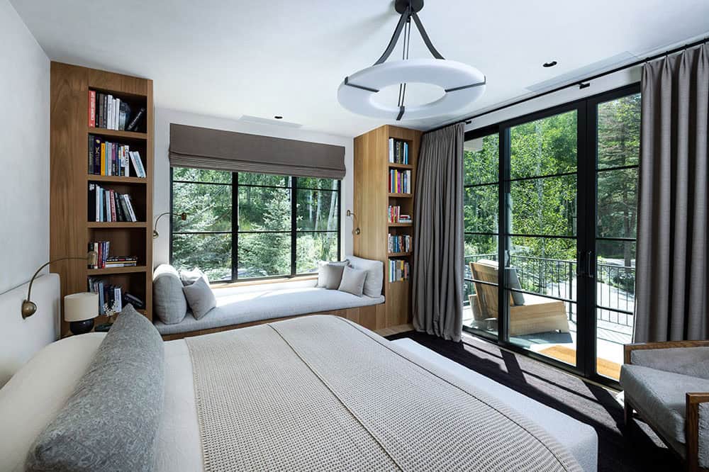 contemporary bedroom with a built-in window seat