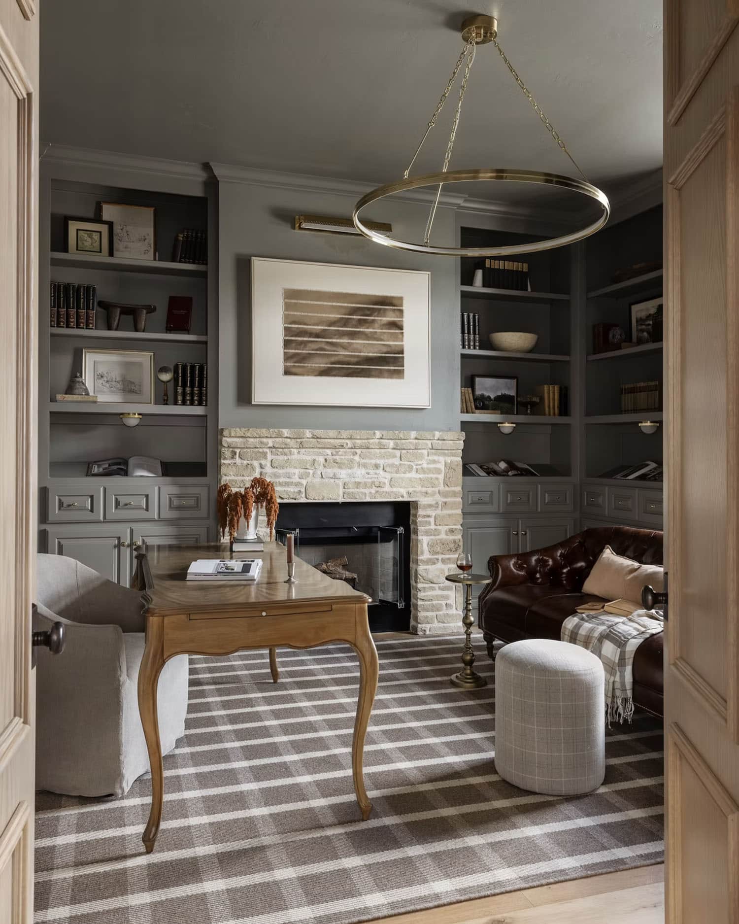 rustic modern style home office with a fireplace