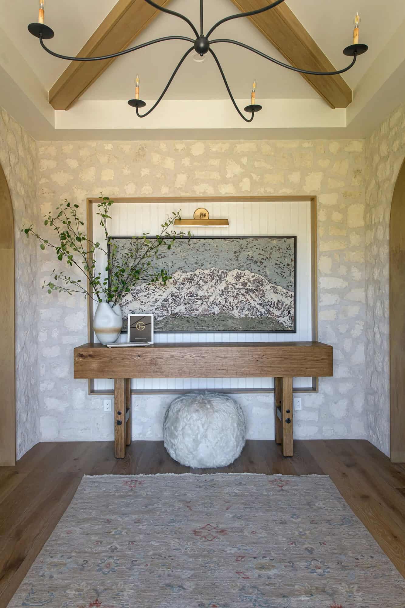 european style home entry with a console table