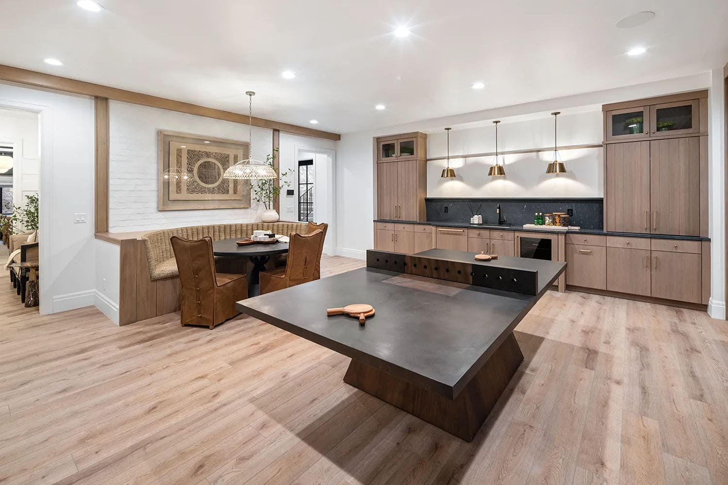 modern family room with a ping pong table 