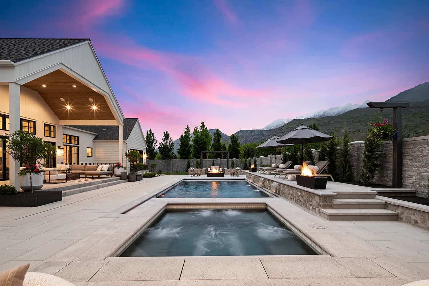 european style home exterior with a pool