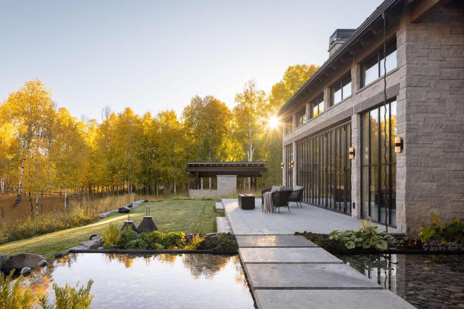 mountain home exterior with a water feature
