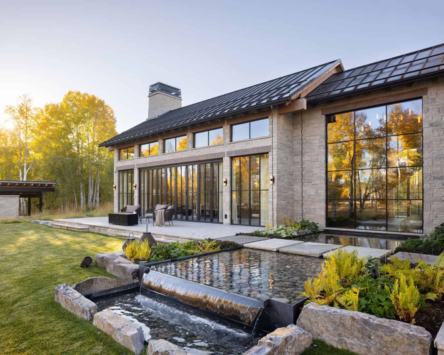 mountain home exterior with a water feature