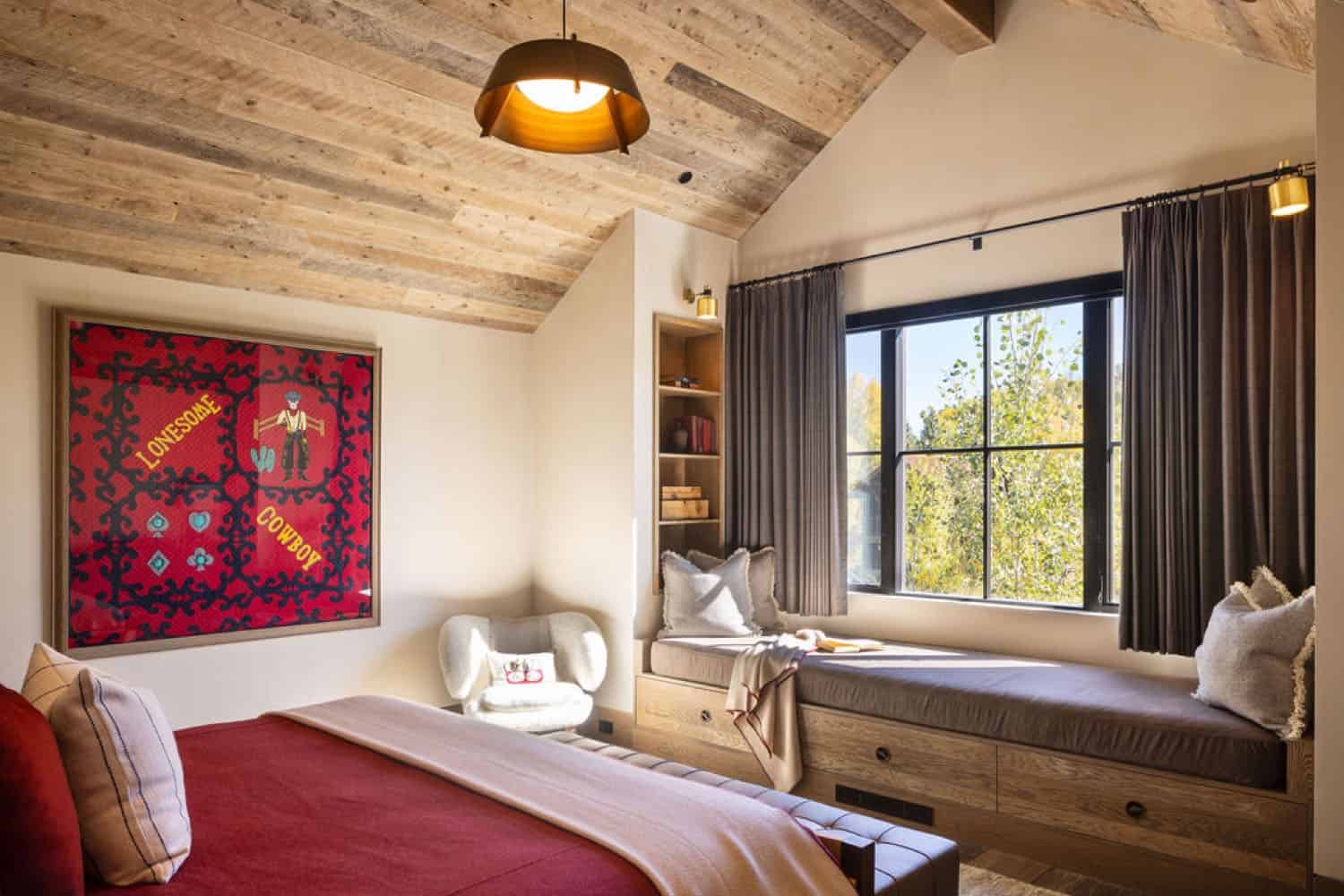 contemporary bedroom with a built-in window seat