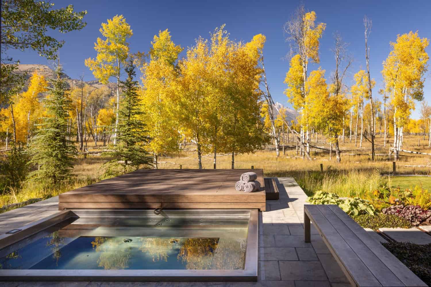 mountain home exterior with a hot tub