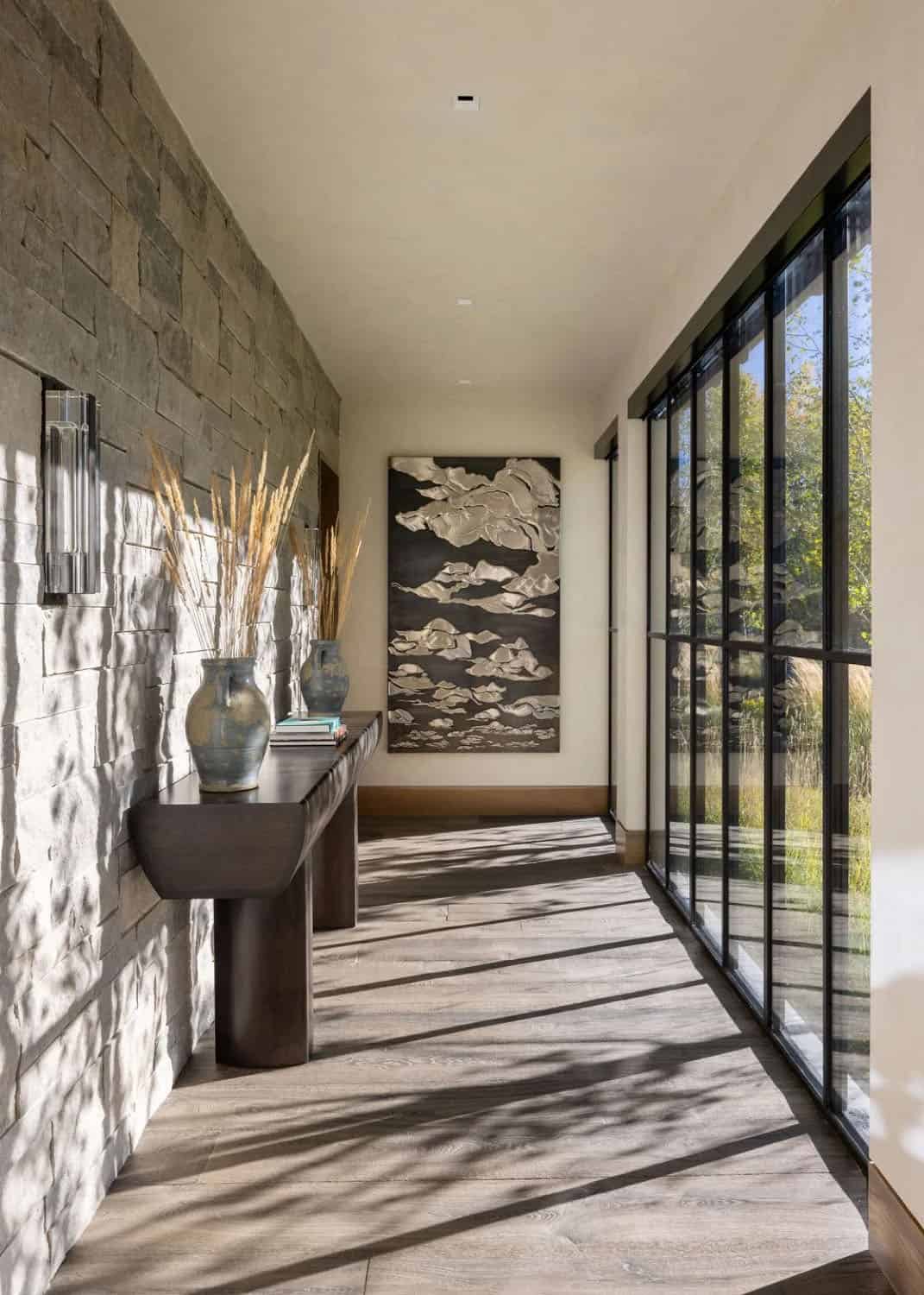 contemporary hallway with floor-to-ceiling glass