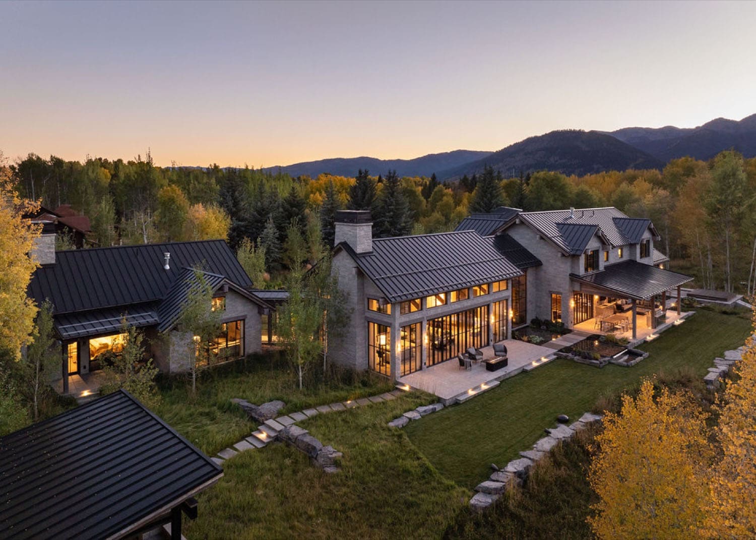 mountain home exterior at dusk