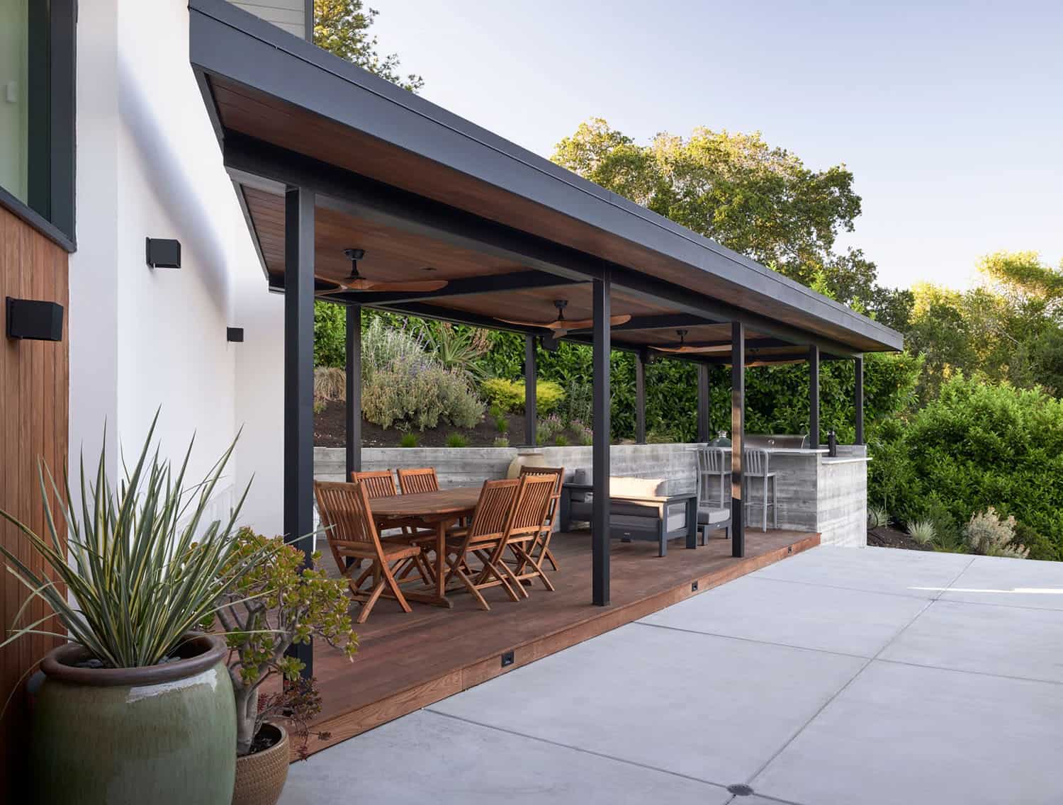 midcentury modern home exterior with a covered porch
