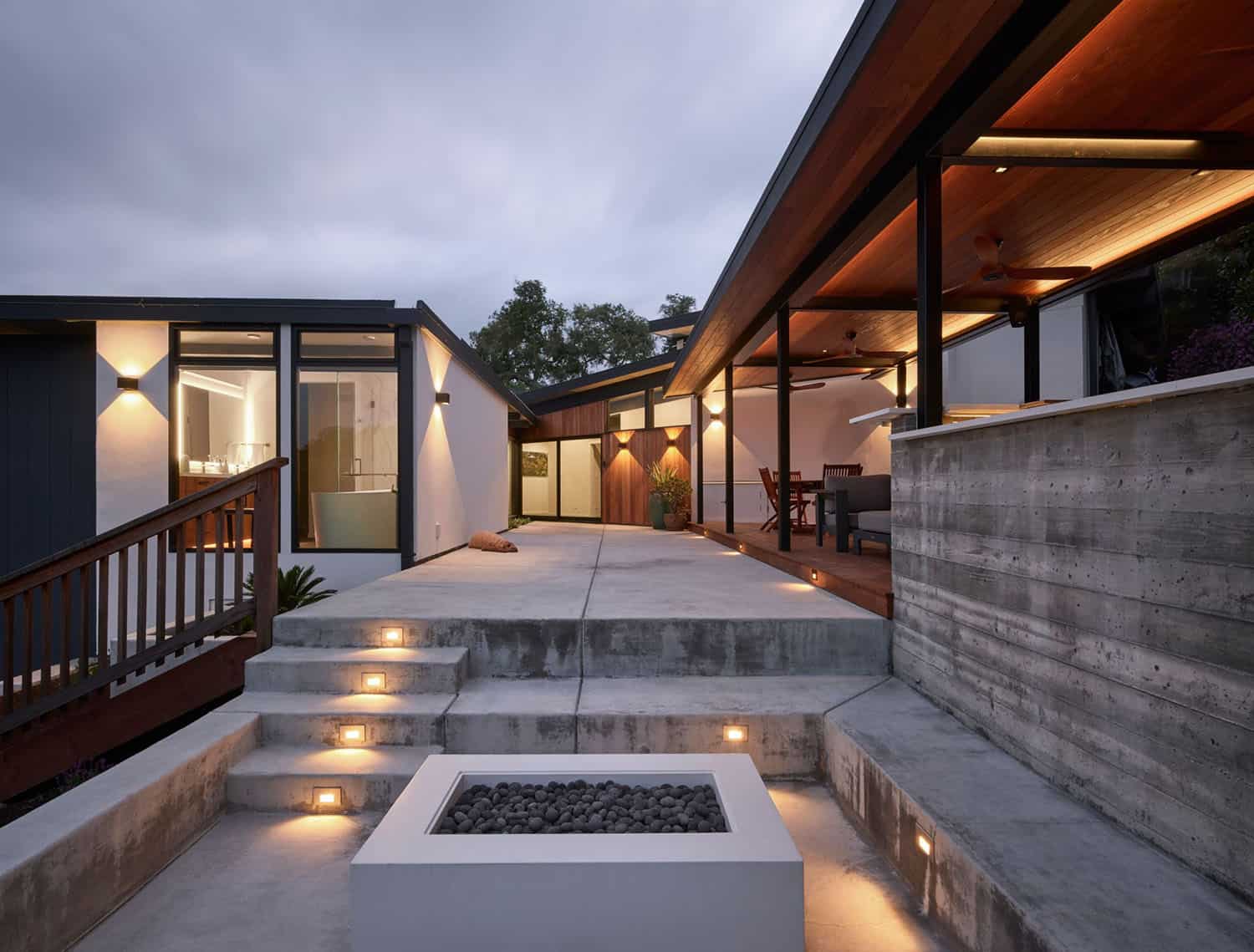 midcentury modern home exterior at dusk