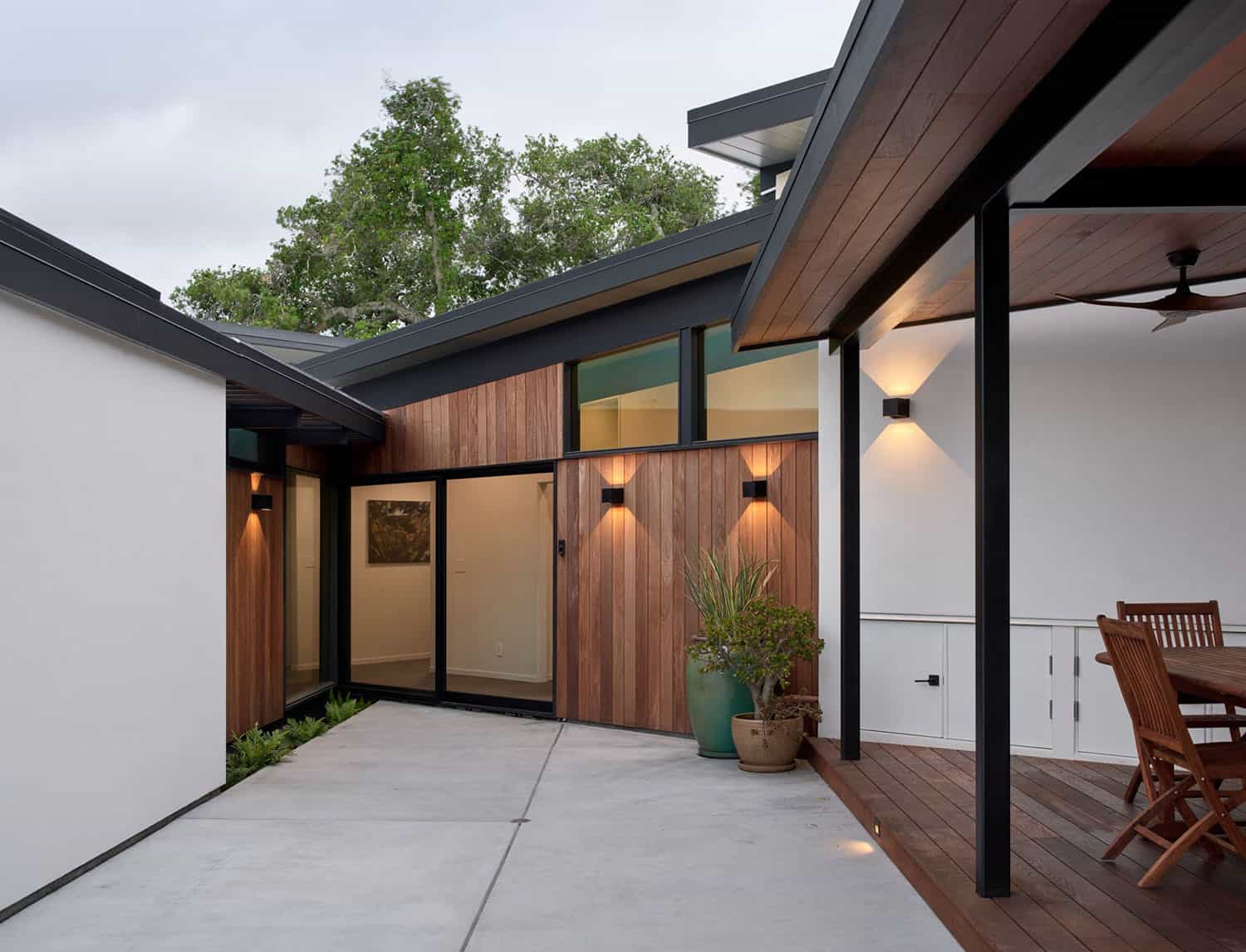 midcentury modern home exterior at dusk