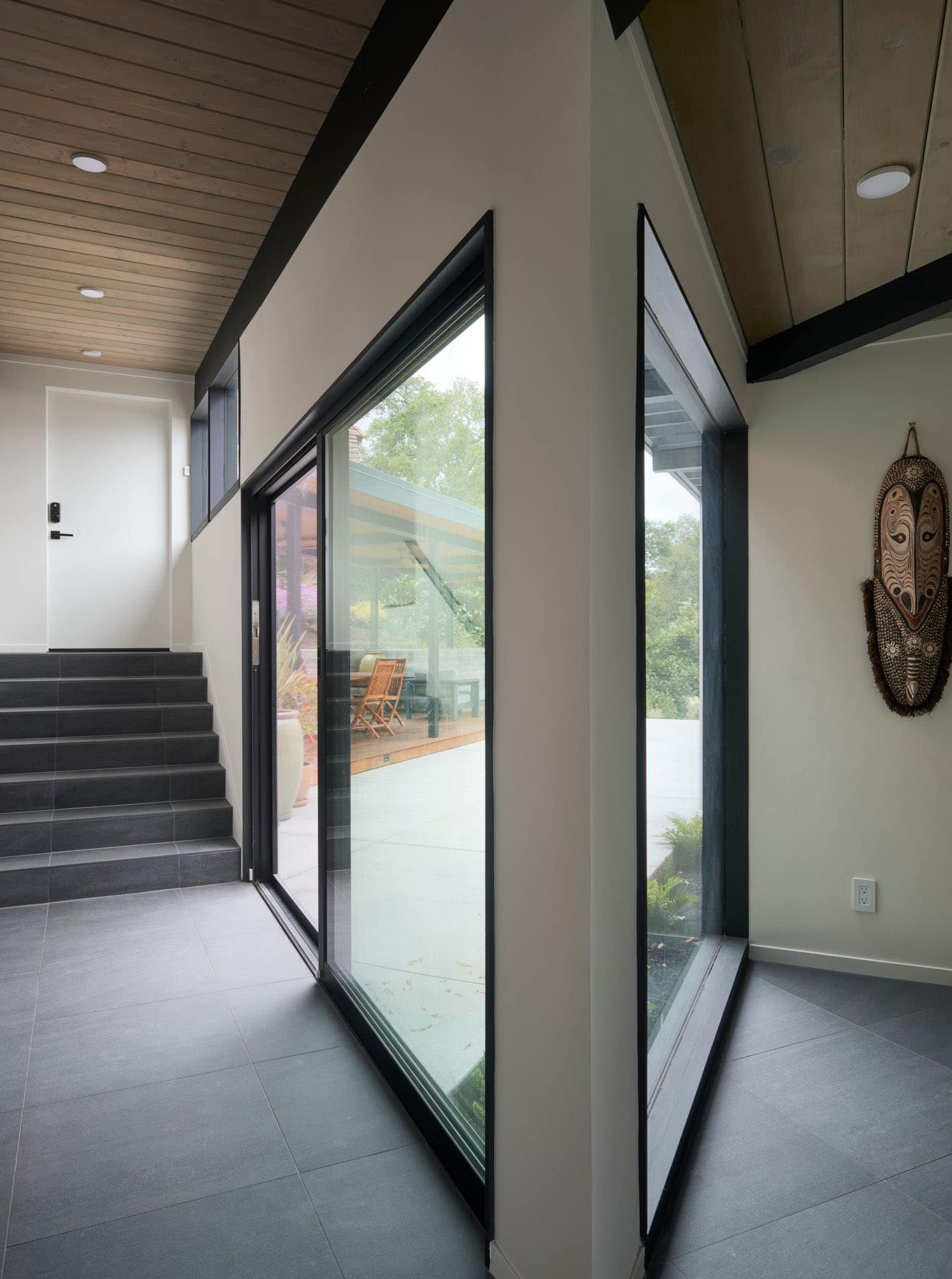midcentury modern hallway with a staircase