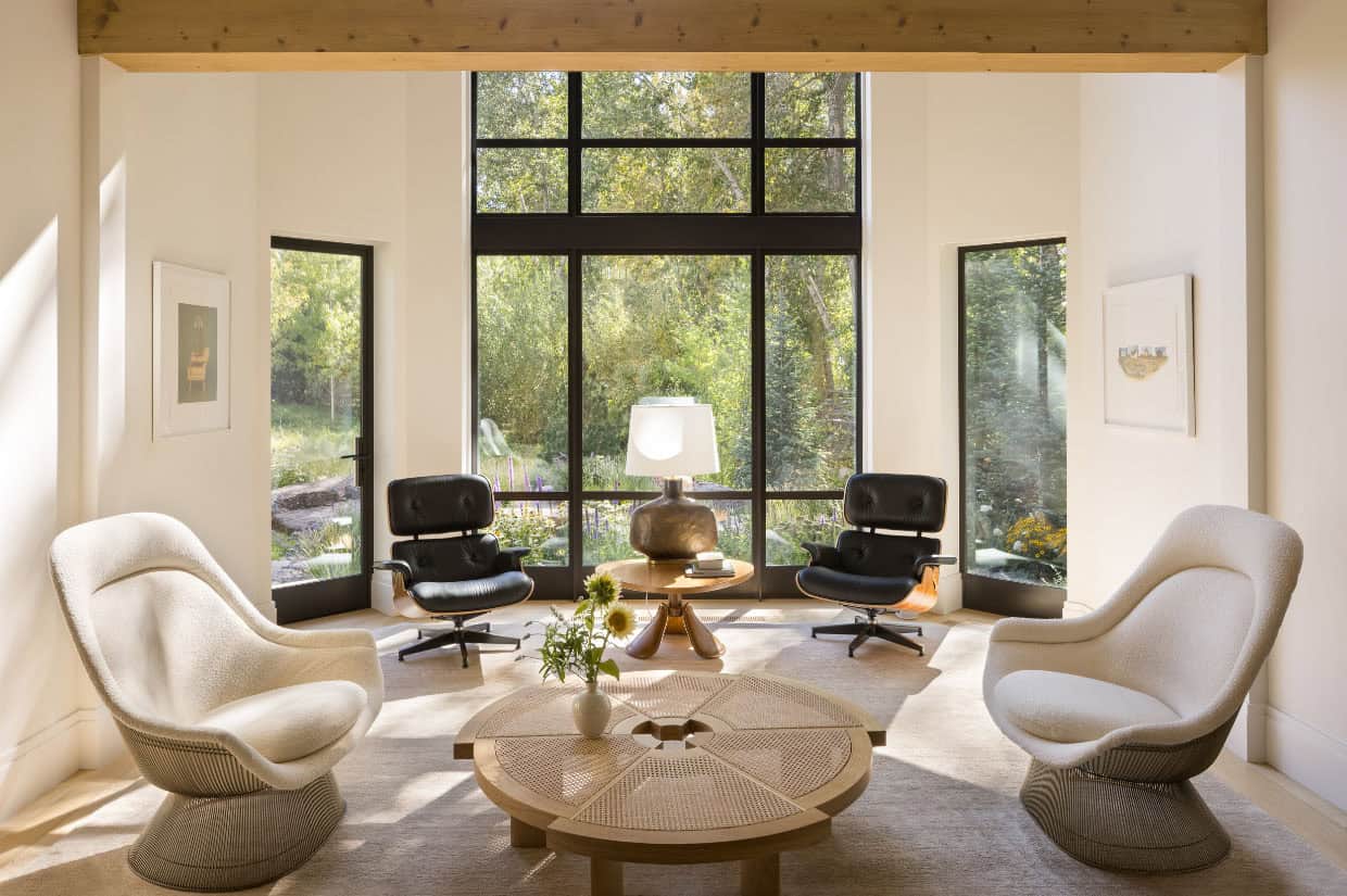 modern living room with mid-century furniture and a large window