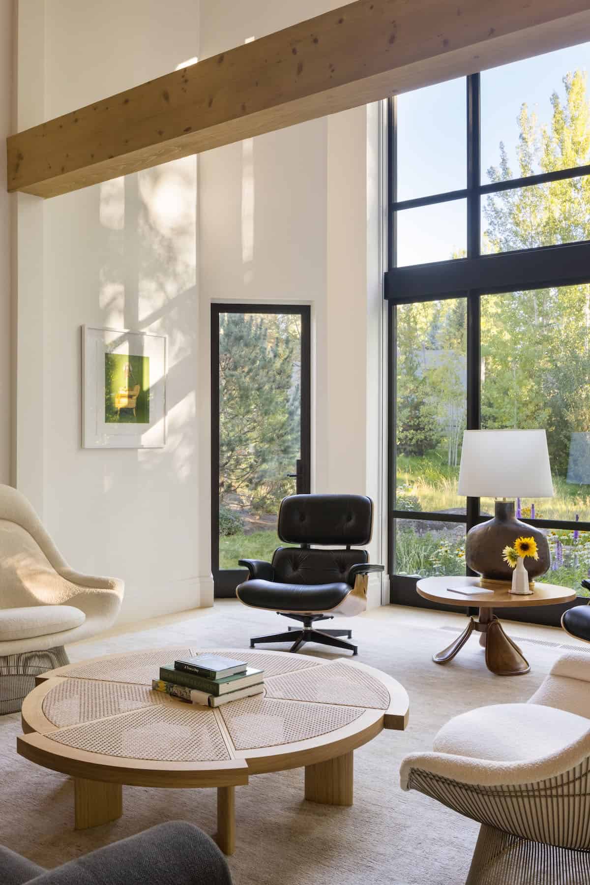 modern living room with mid-century furniture and a large window