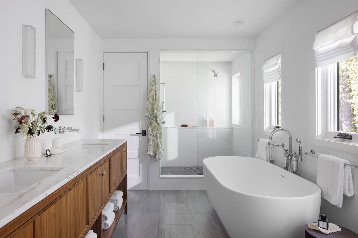 modern bathroom with a vanity and soaking tub