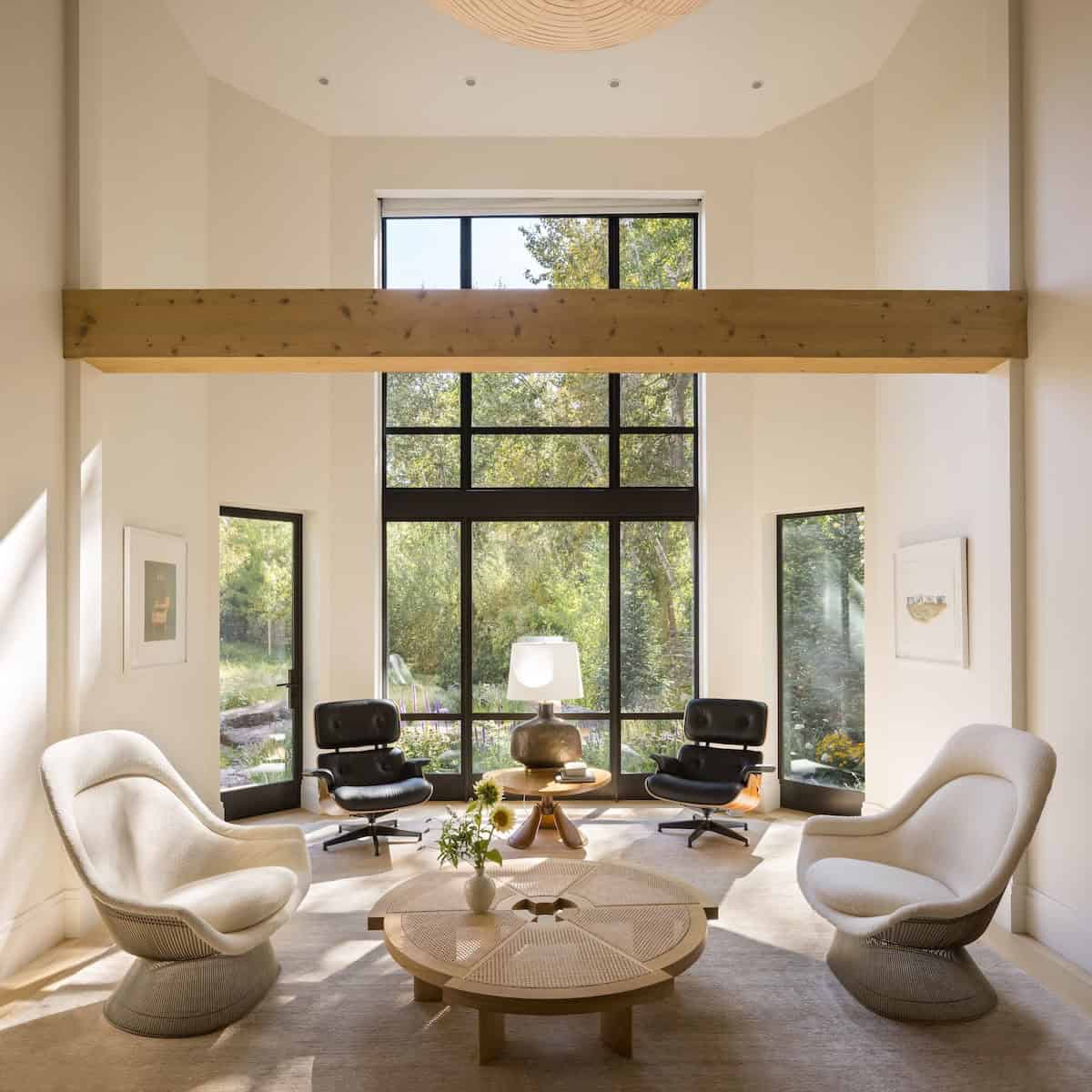 modern living room with mid-century furniture and a large window