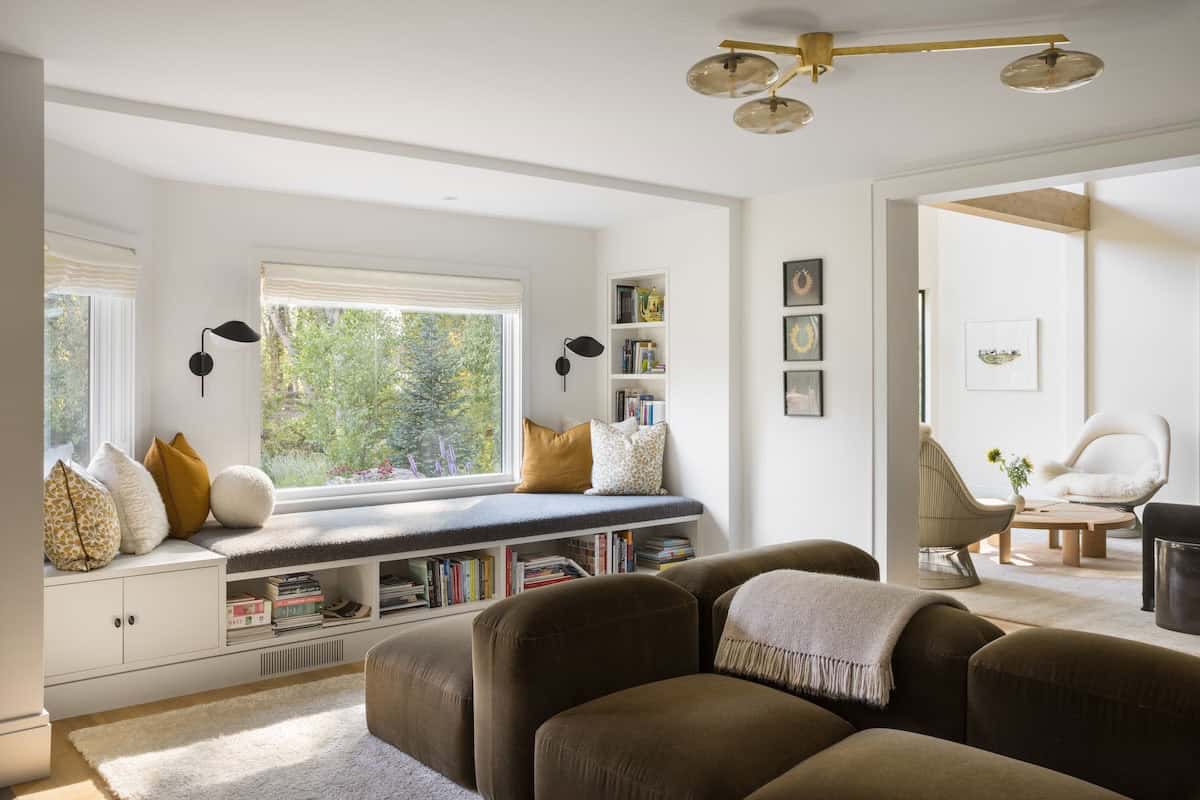modern family room with a built-in window seat