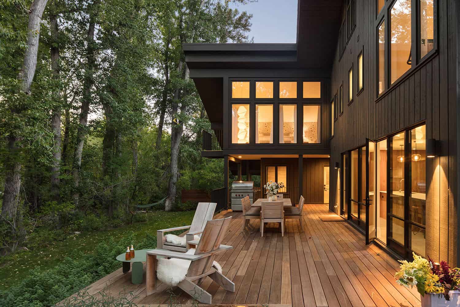modern mountain home exterior with a large deck