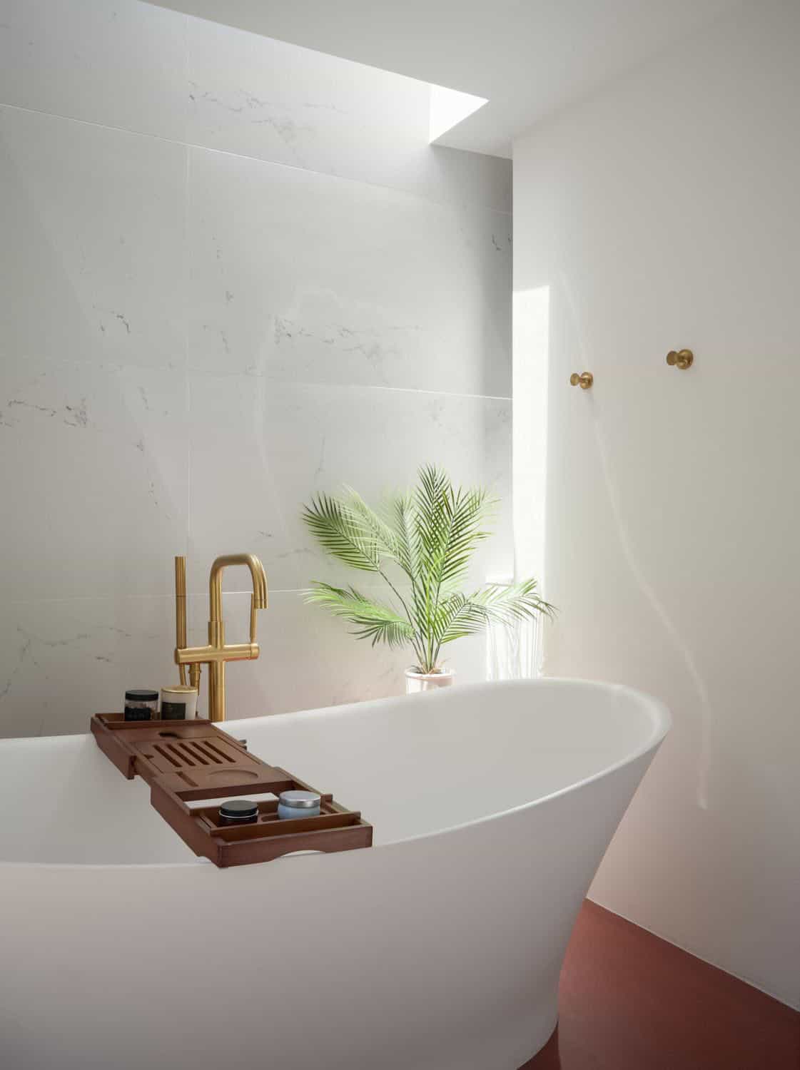 midcentury modern bathroom with a freestanding tub