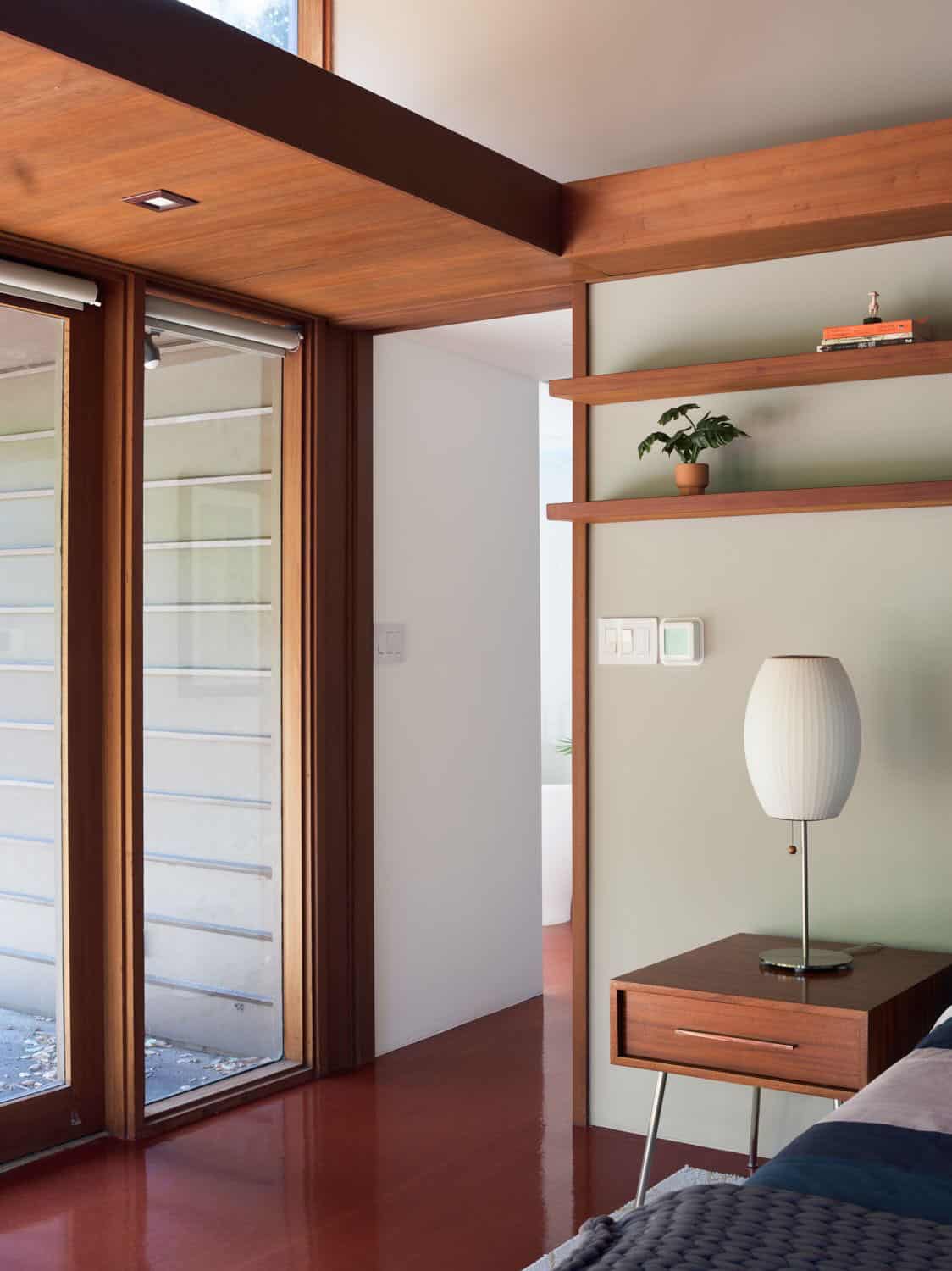 midcentury modern bedroom with sliding glass doors