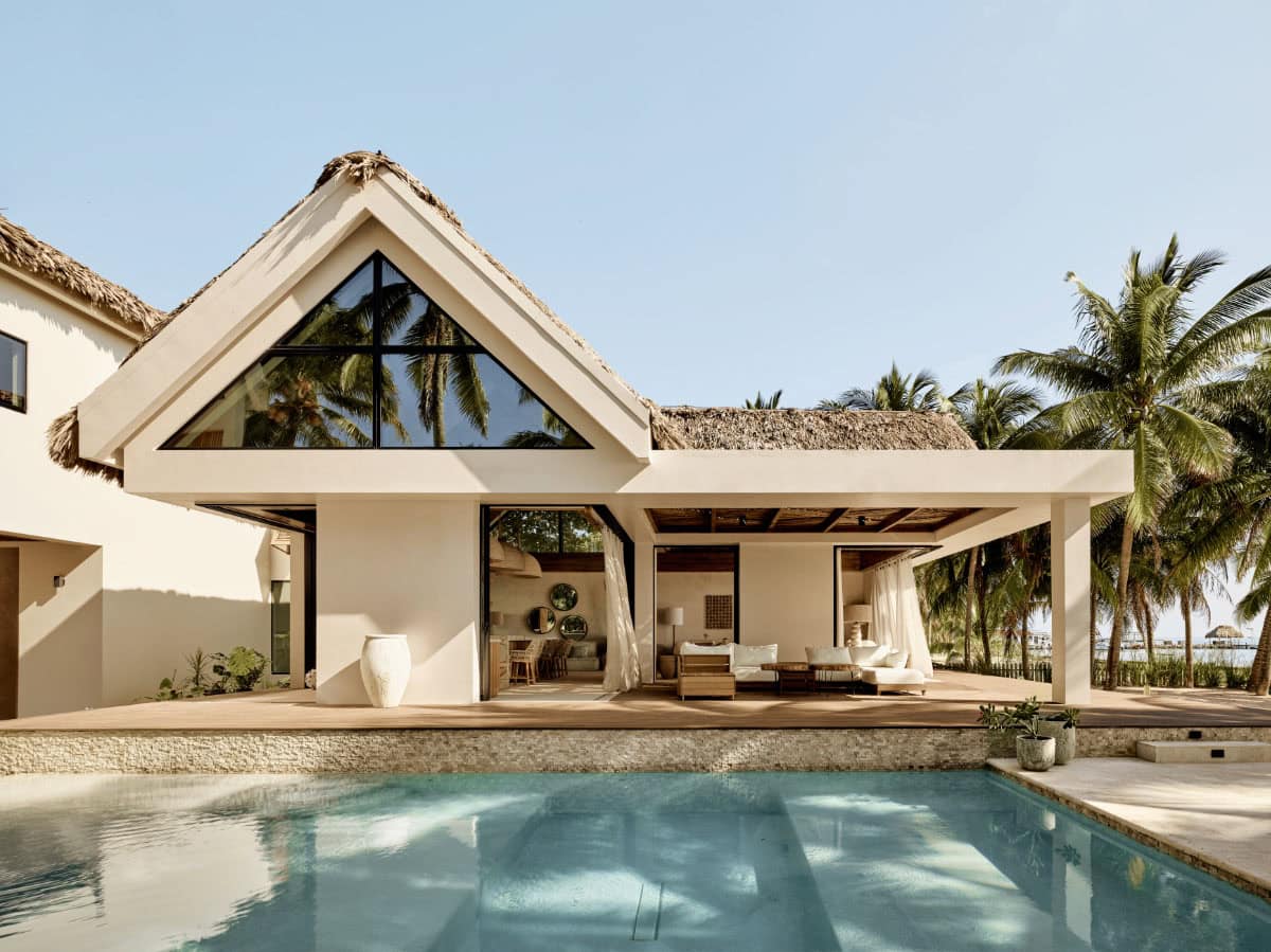 modern coastal home exterior with a pool