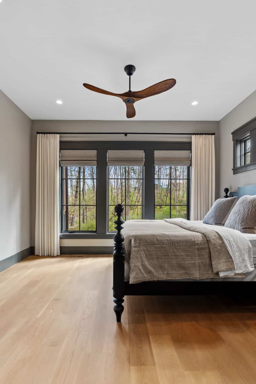 modern bedroom with a large window