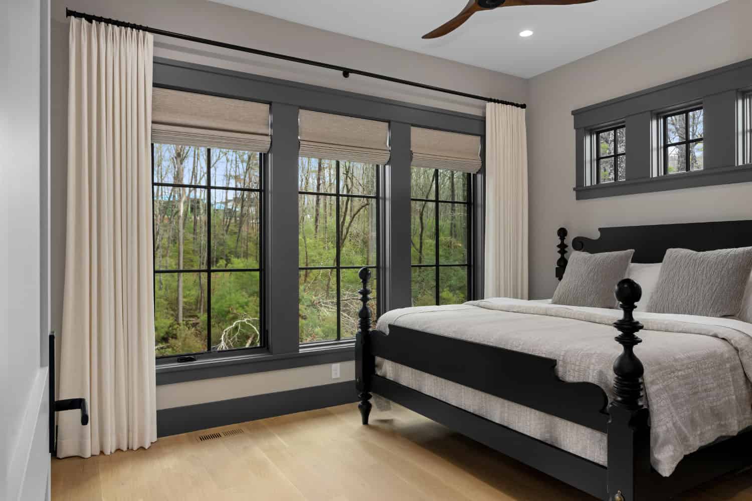 modern bedroom with a large window