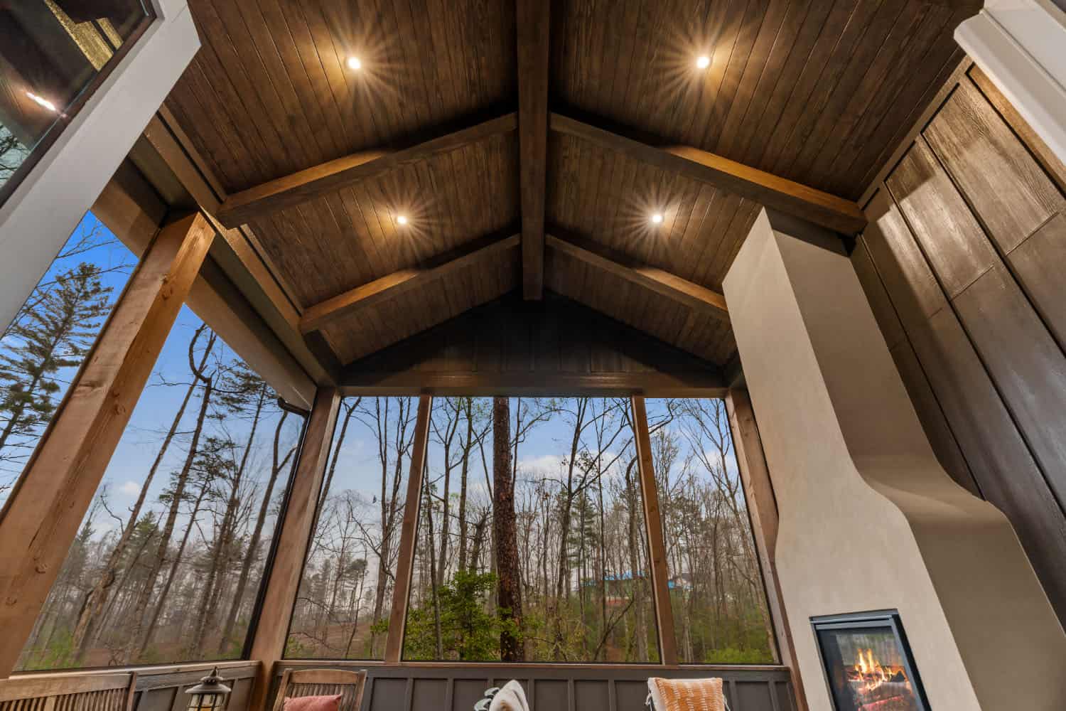 modern screened porch with a ceiling detail
