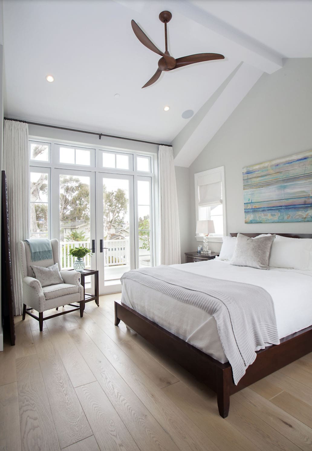 transitional style bedroom with french doors