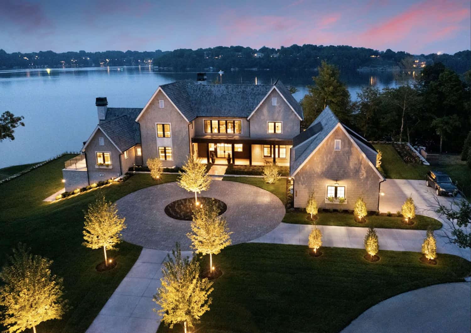 modern lake house exterior at dusk