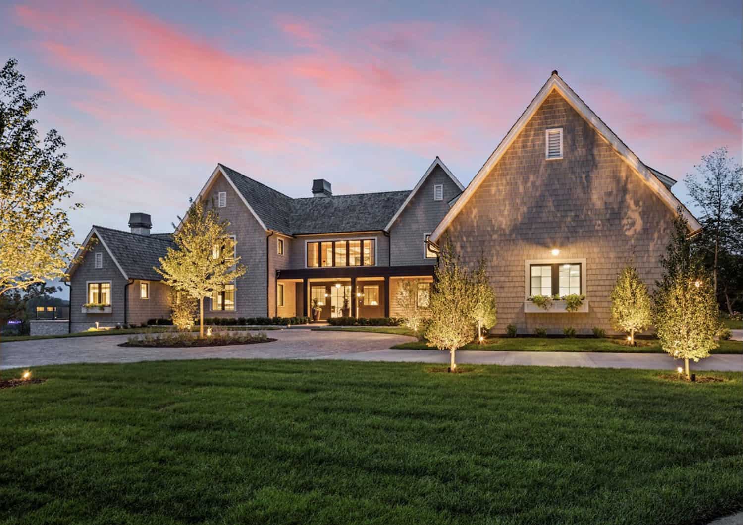 modern lake house exterior at dusk