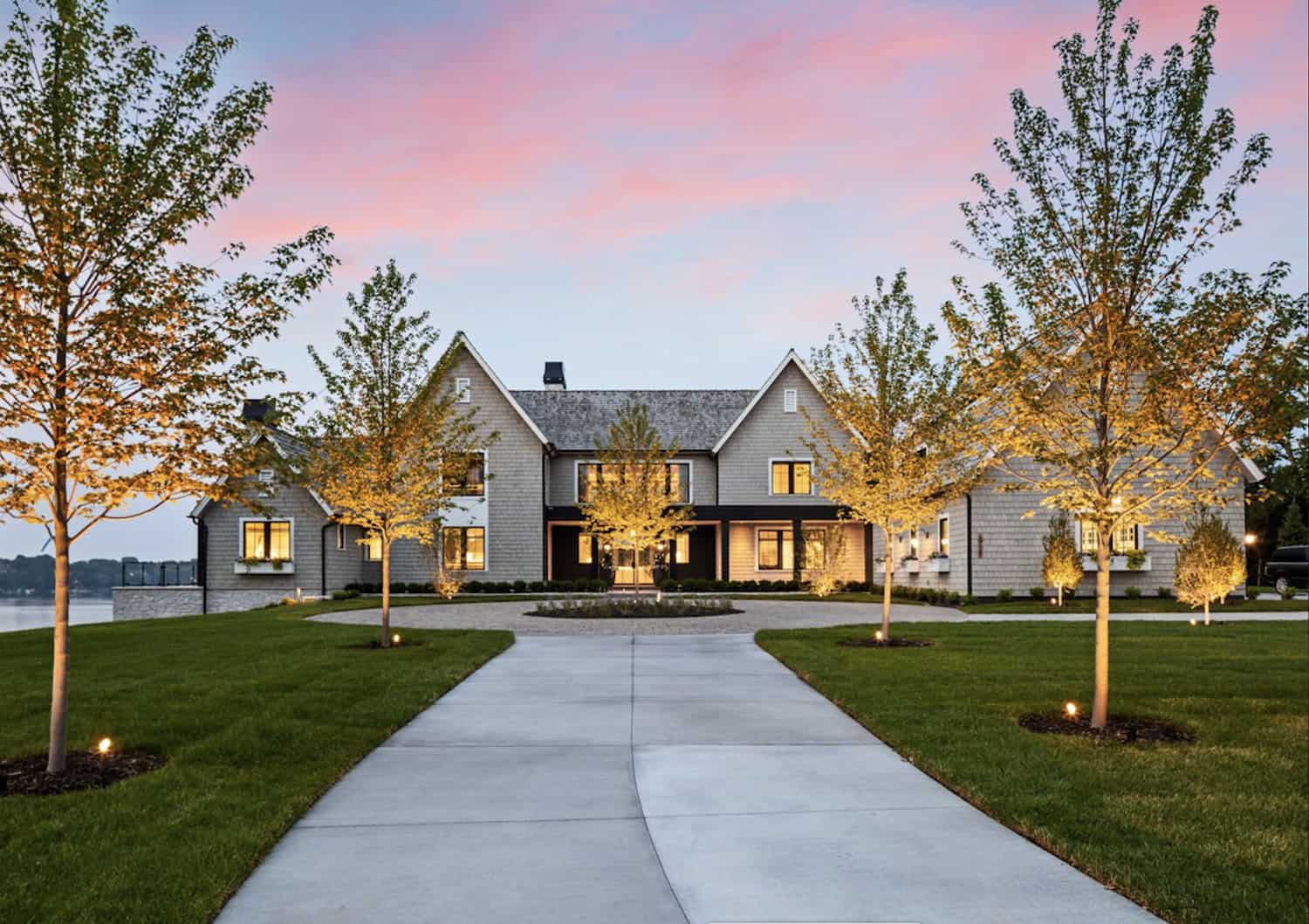 modern lake house exterior at dusk