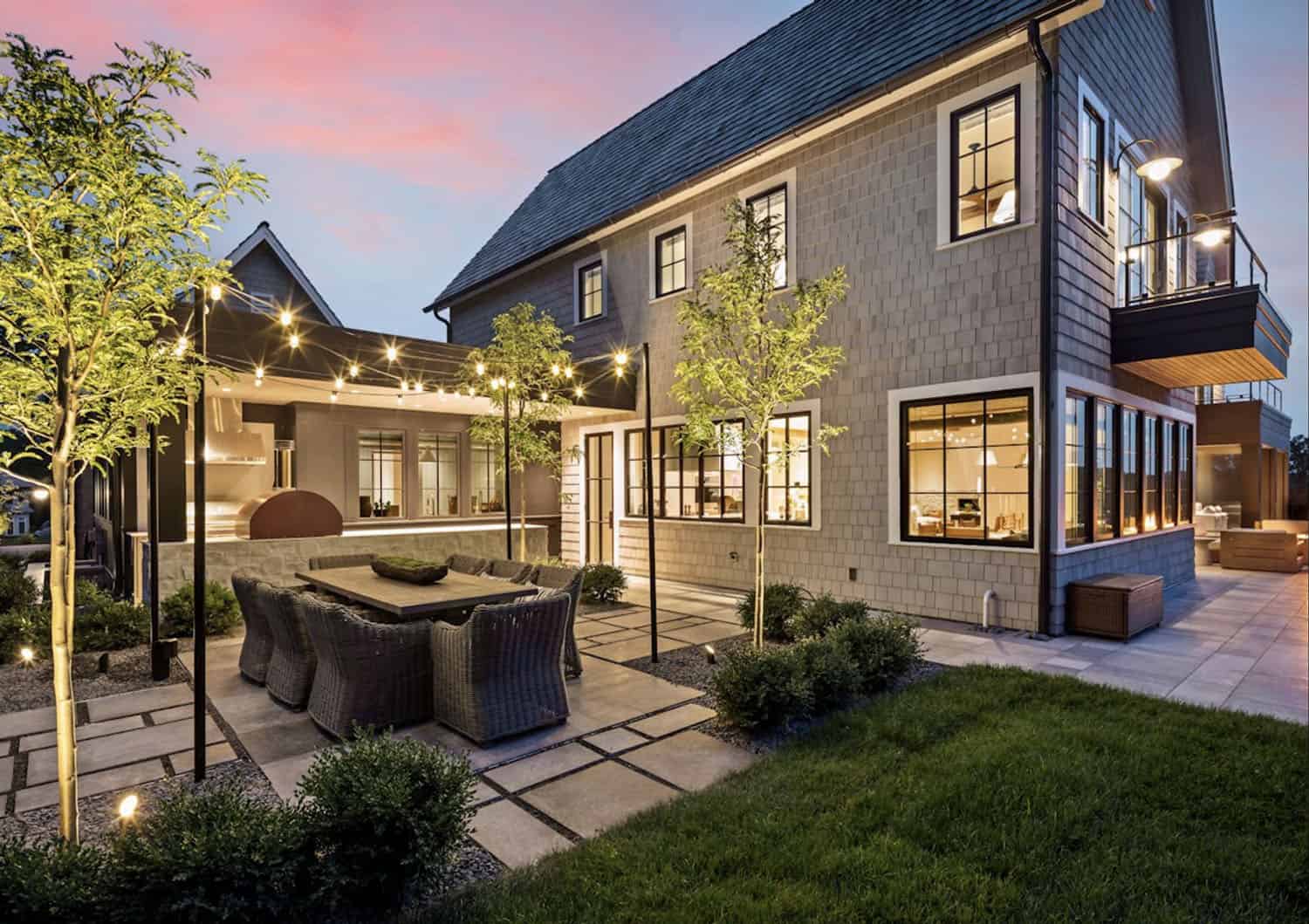 modern lake house exterior with a patio