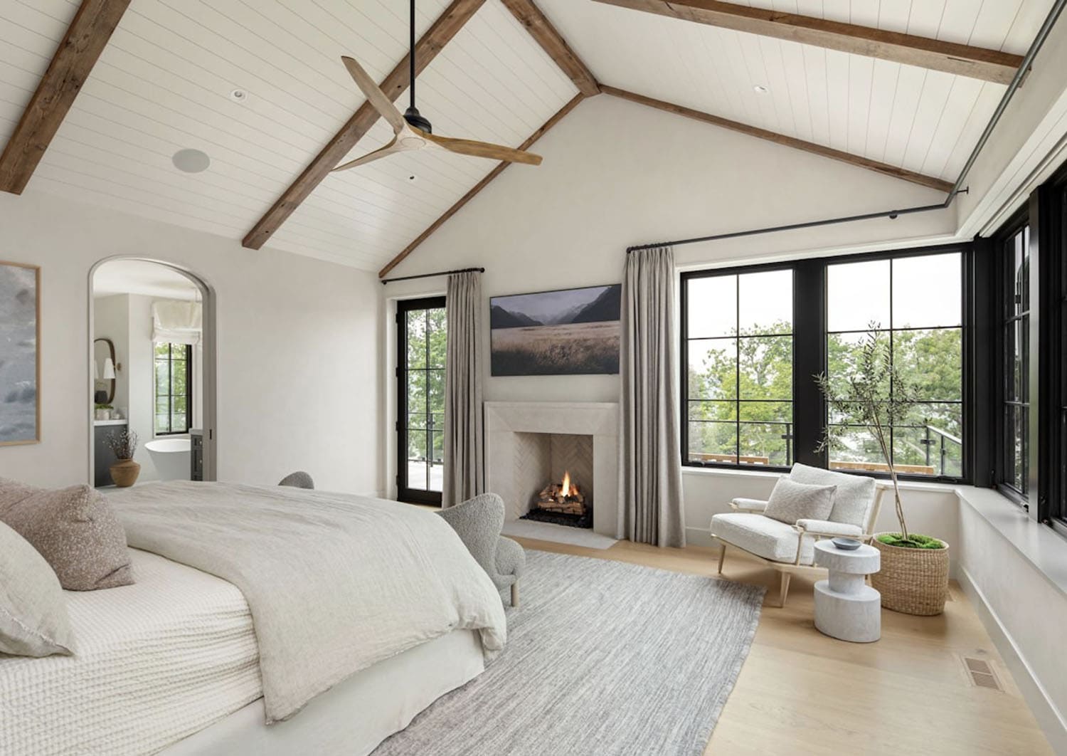 modern bedroom with a fireplace