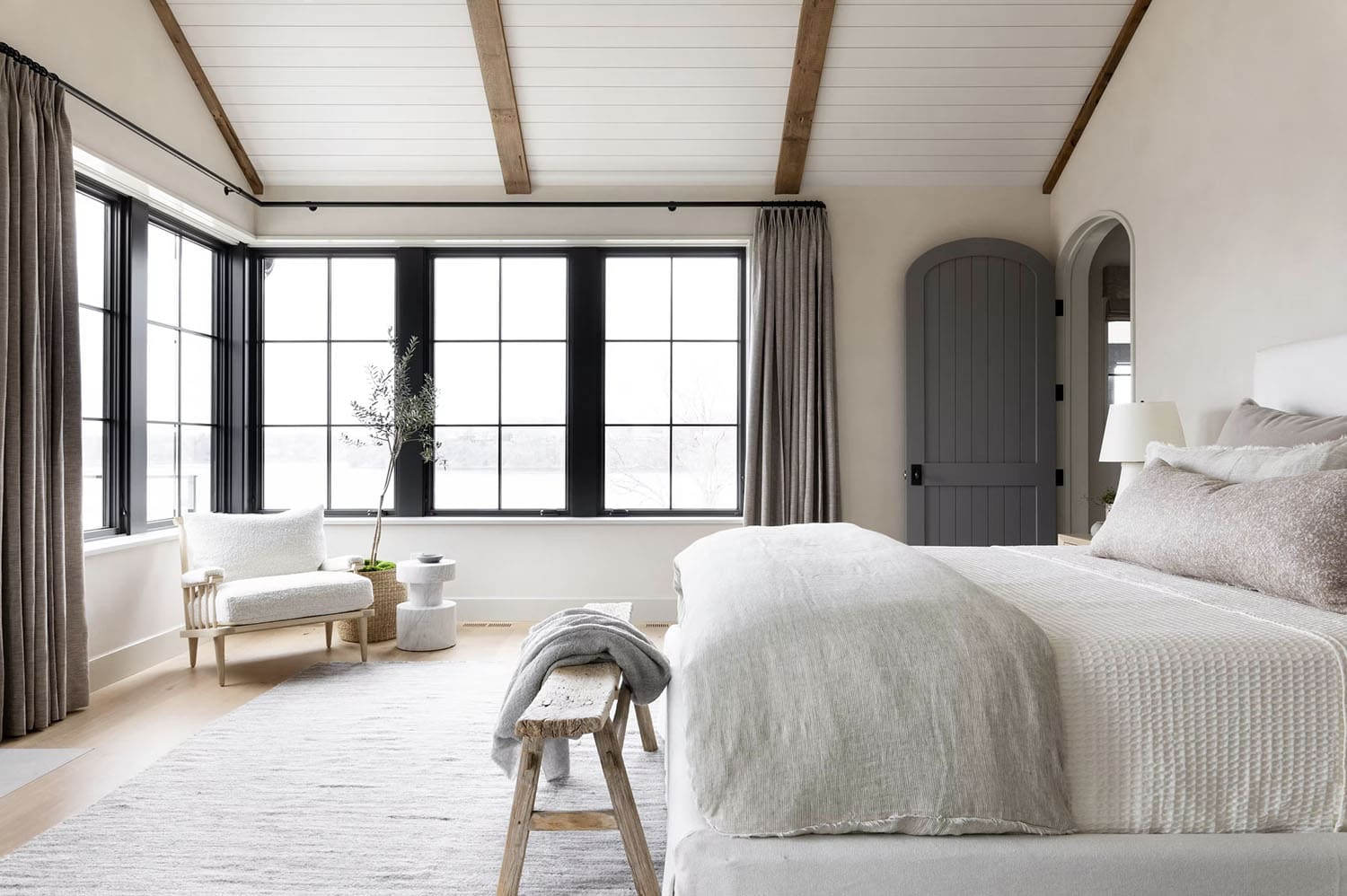 modern bedroom with a large window