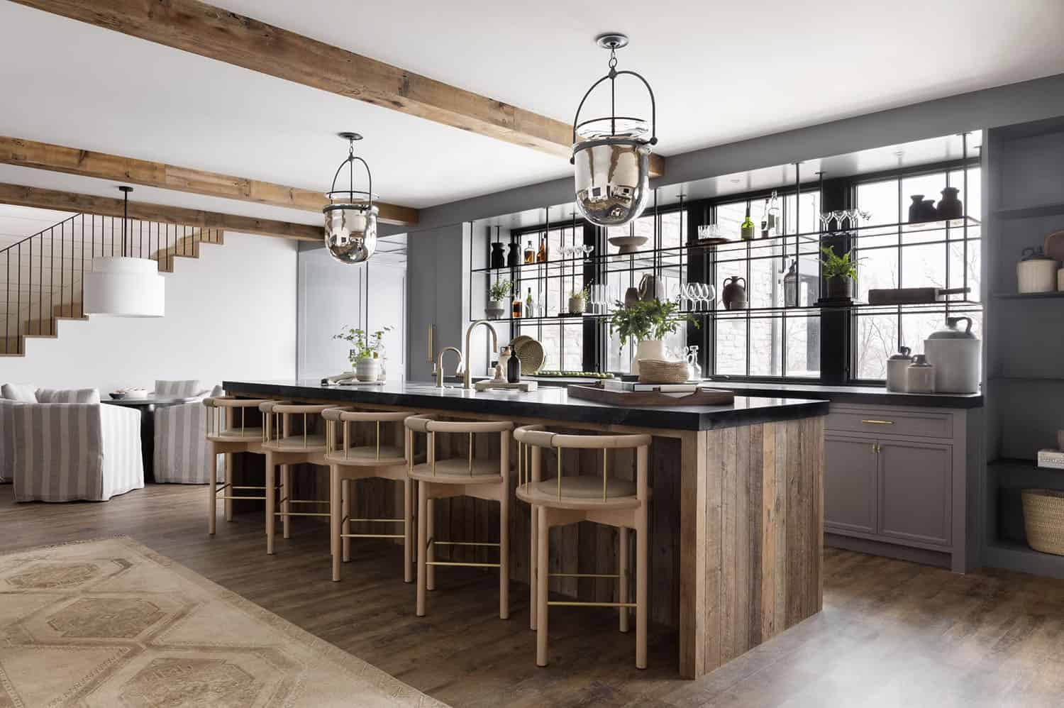 modern home bar with large pendant lights