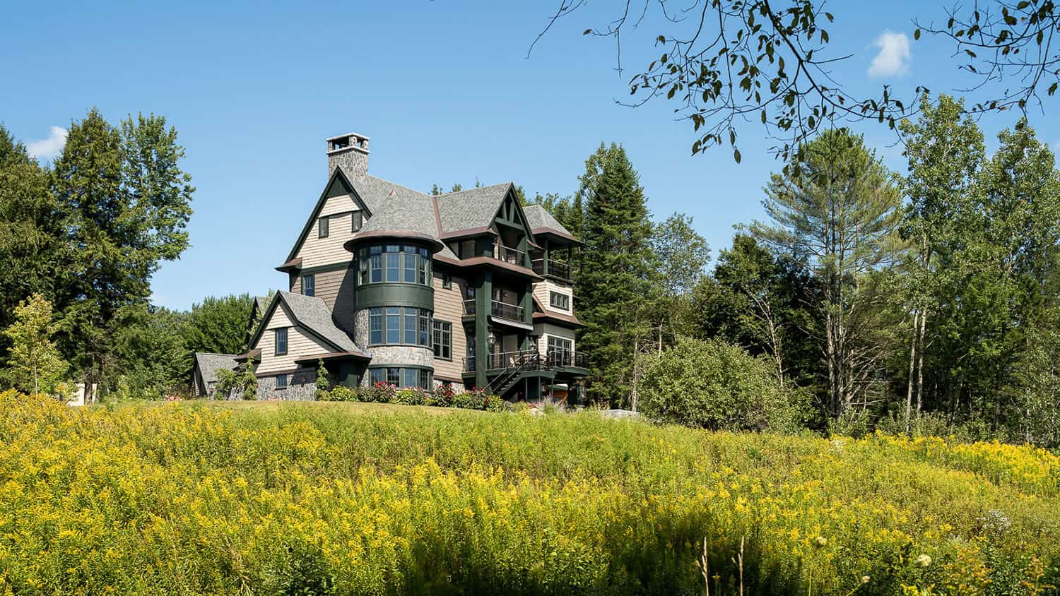 A large house sitting on top of a hill