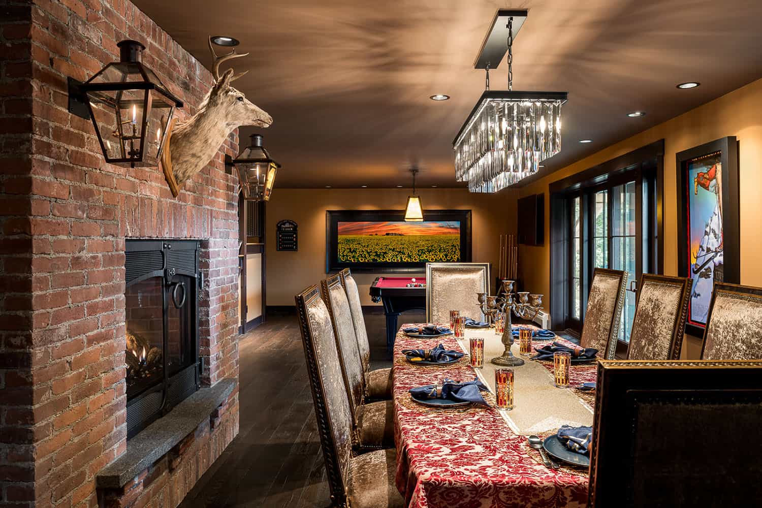 A living room with a fireplace and bookshelves