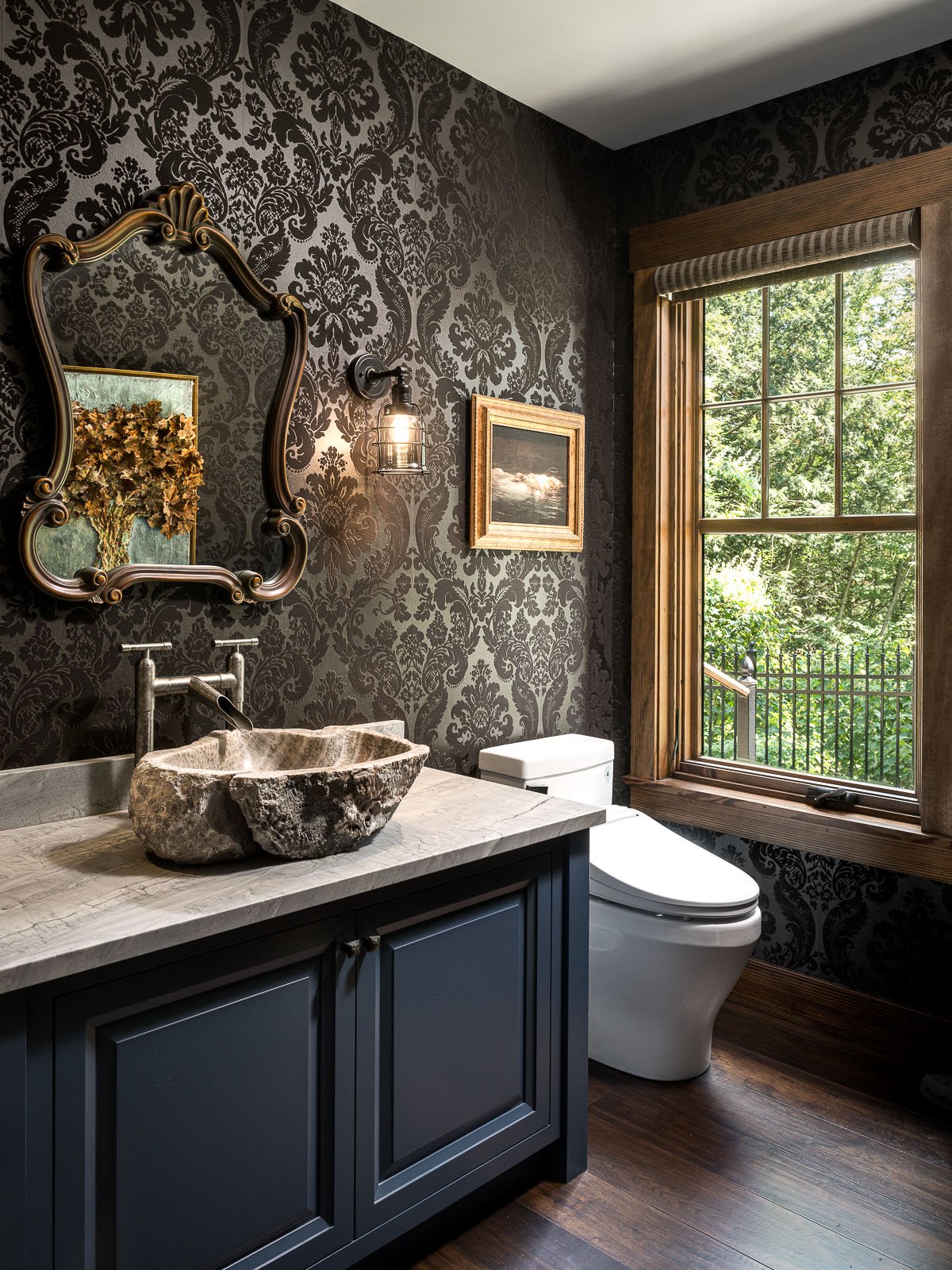 A bathroom with a sink and a window