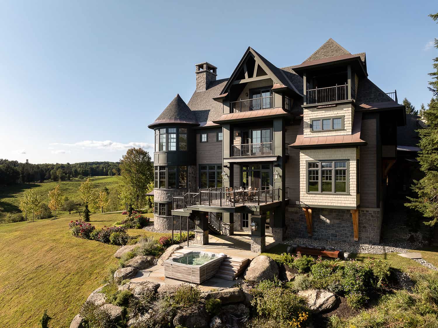 A large home with a hot tub on the side