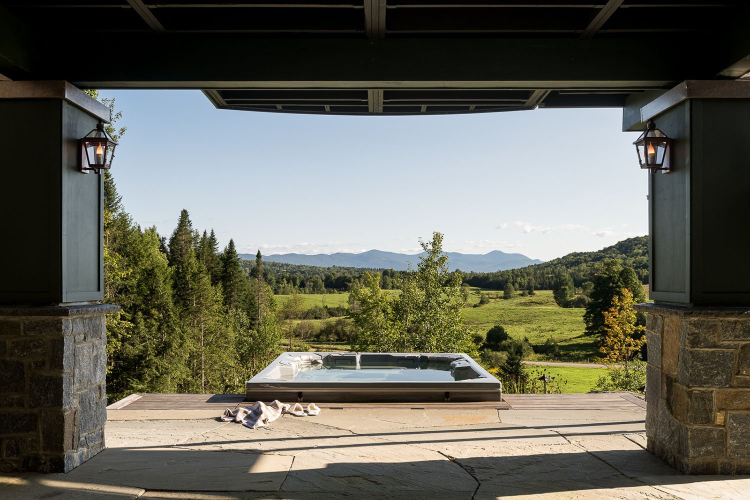 A view of a hot tub from a porch
