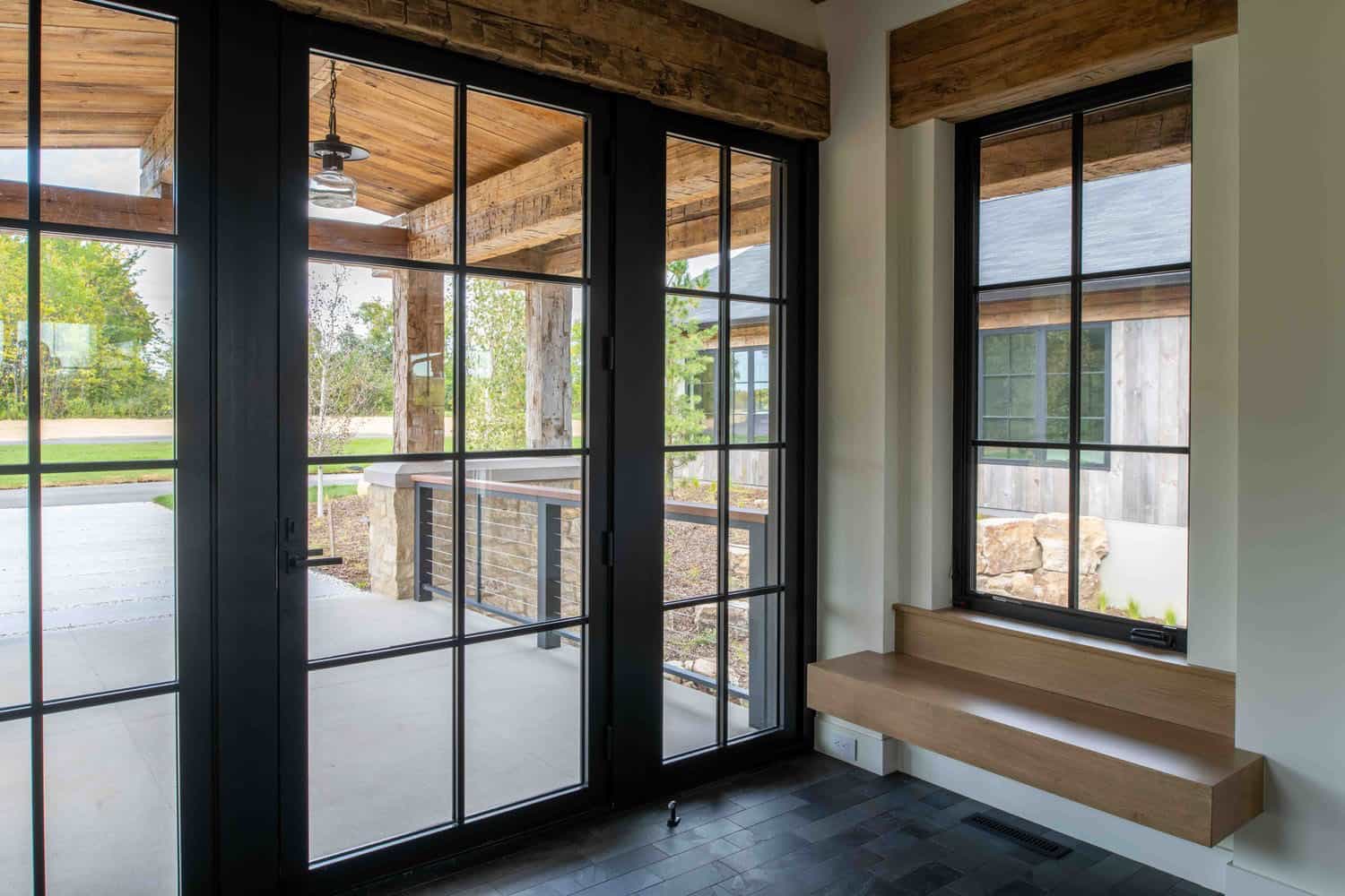 modern modern home entry with a bench