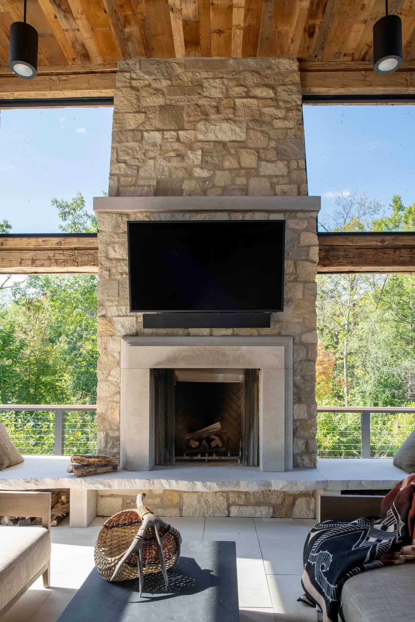 modern modern screened porch with a fireplace