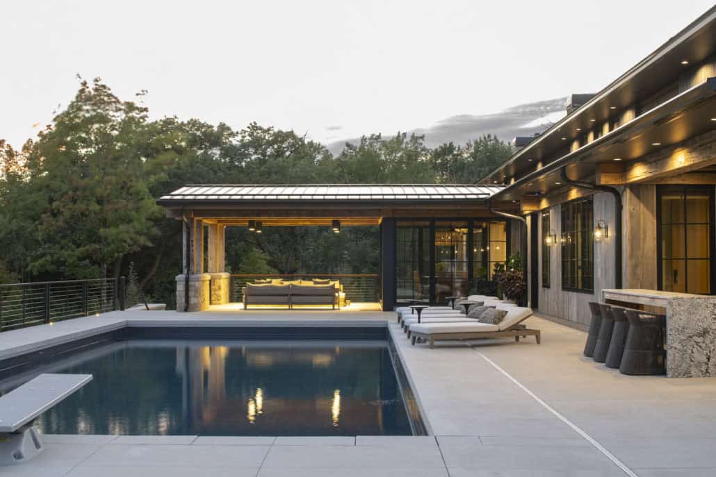 modern modern home exterior with a pool