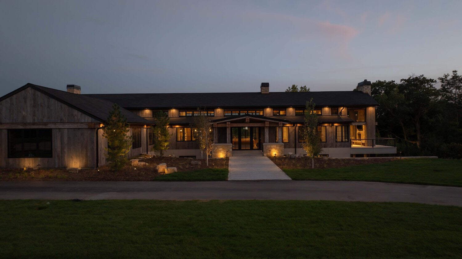 modern modern home exterior at dusk