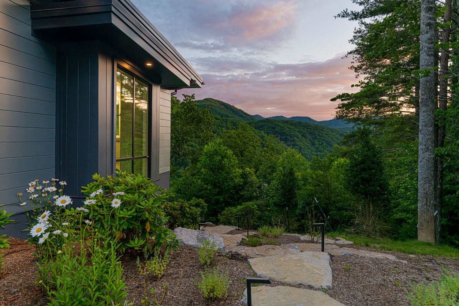 modern mountain home exterior with a view