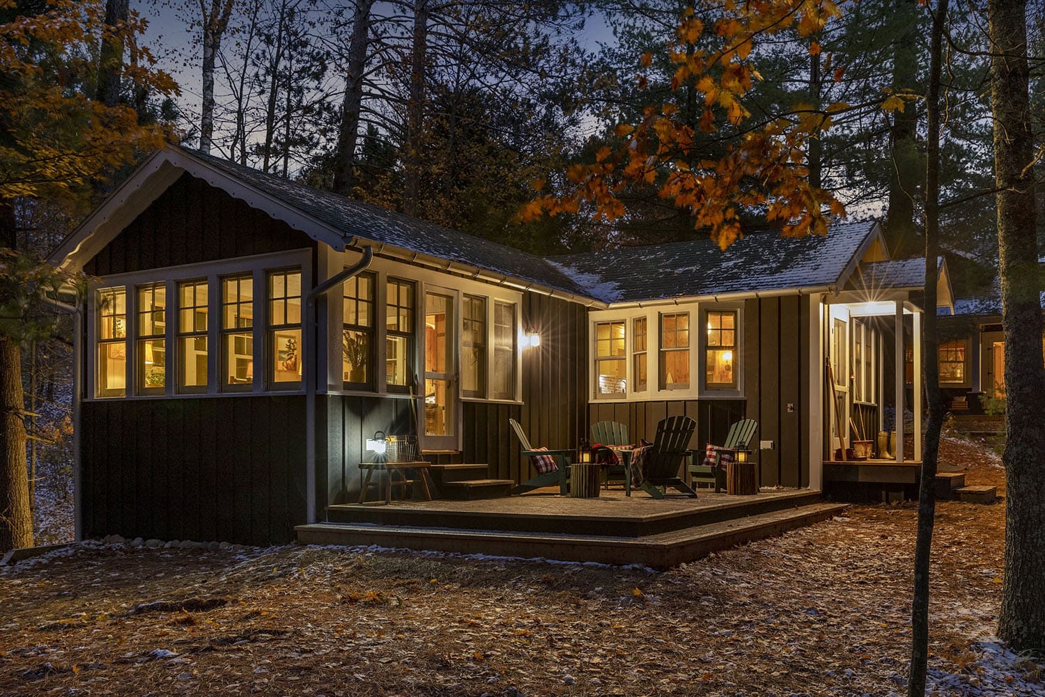 modern rustic cabin exterior at dusk
