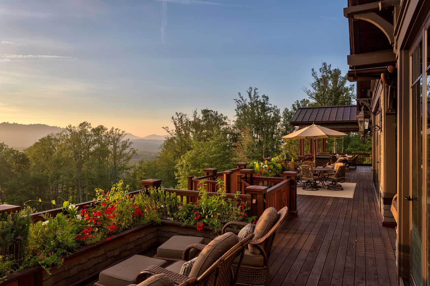 modern rustic mountain home exterior with a patio