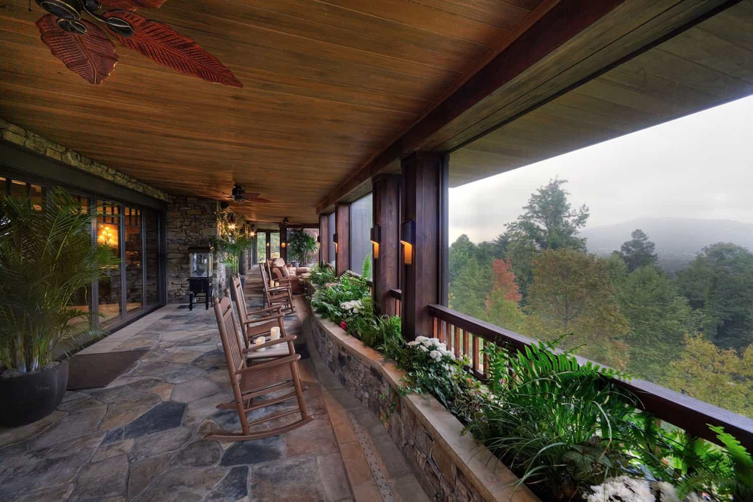modern rustic covered porch with a view of the mountains