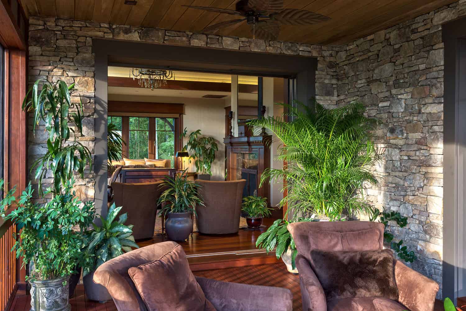 modern rustic mountain guest house with a covered patio